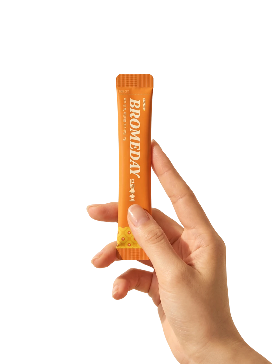 Isolated hand holding a Bromeday stick