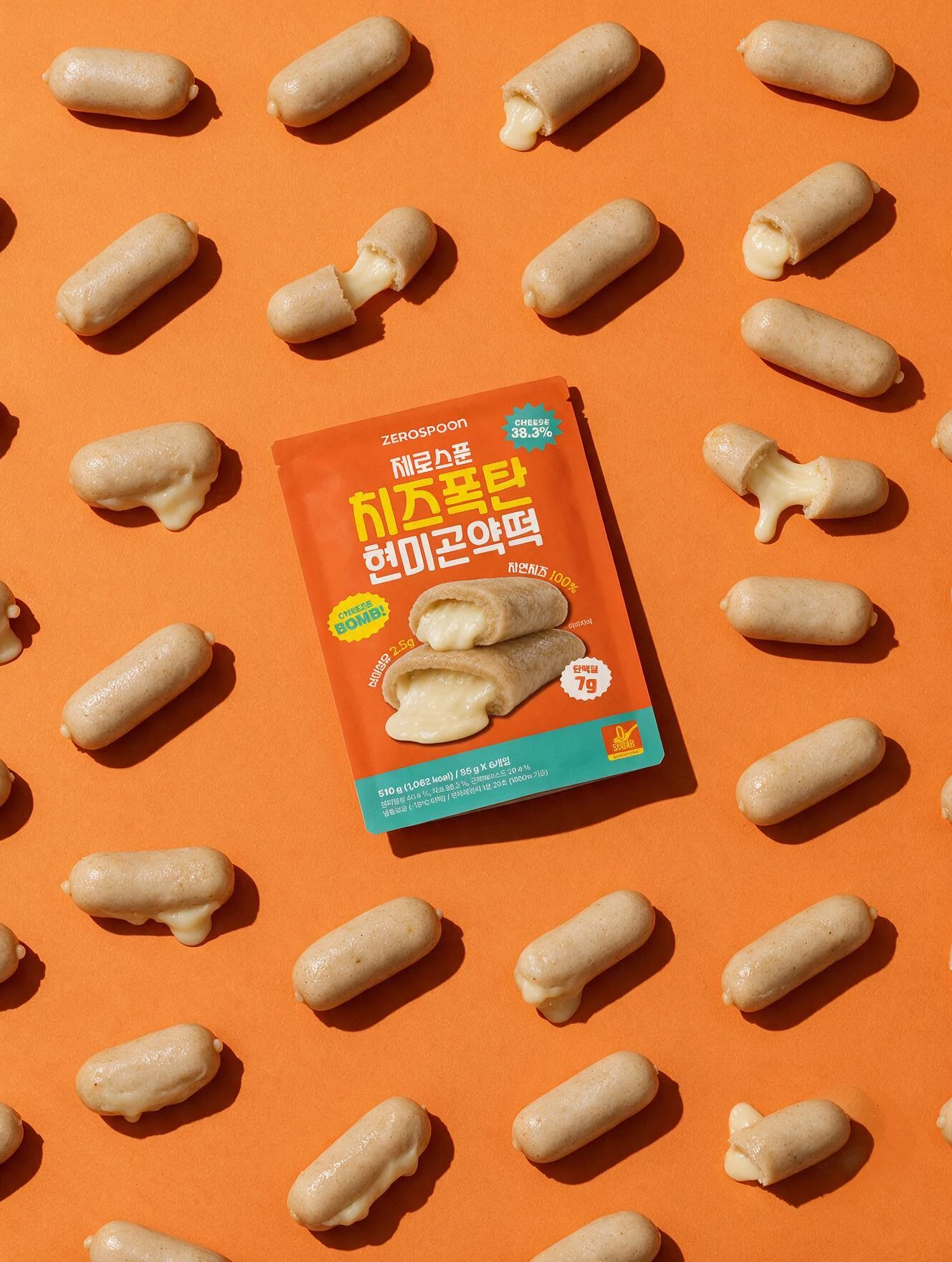 Product pouch surrounded by tteok on orange